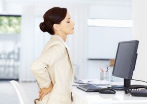 Osteochondrosis of the lower back when working while sitting